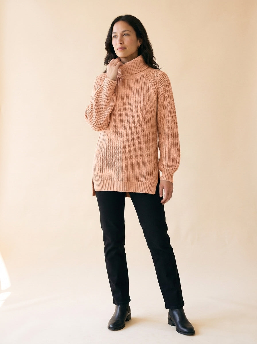 Women's Split-Hem Turtleneck Sweater in Pink - model