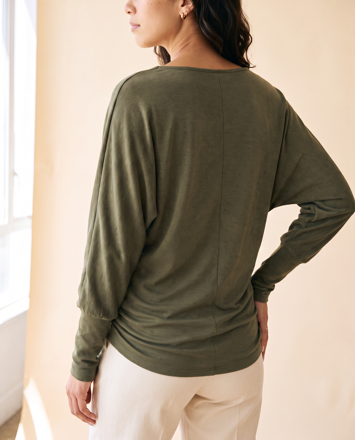 Women's Minimalist Long-Sleeve Top in Green - model second view