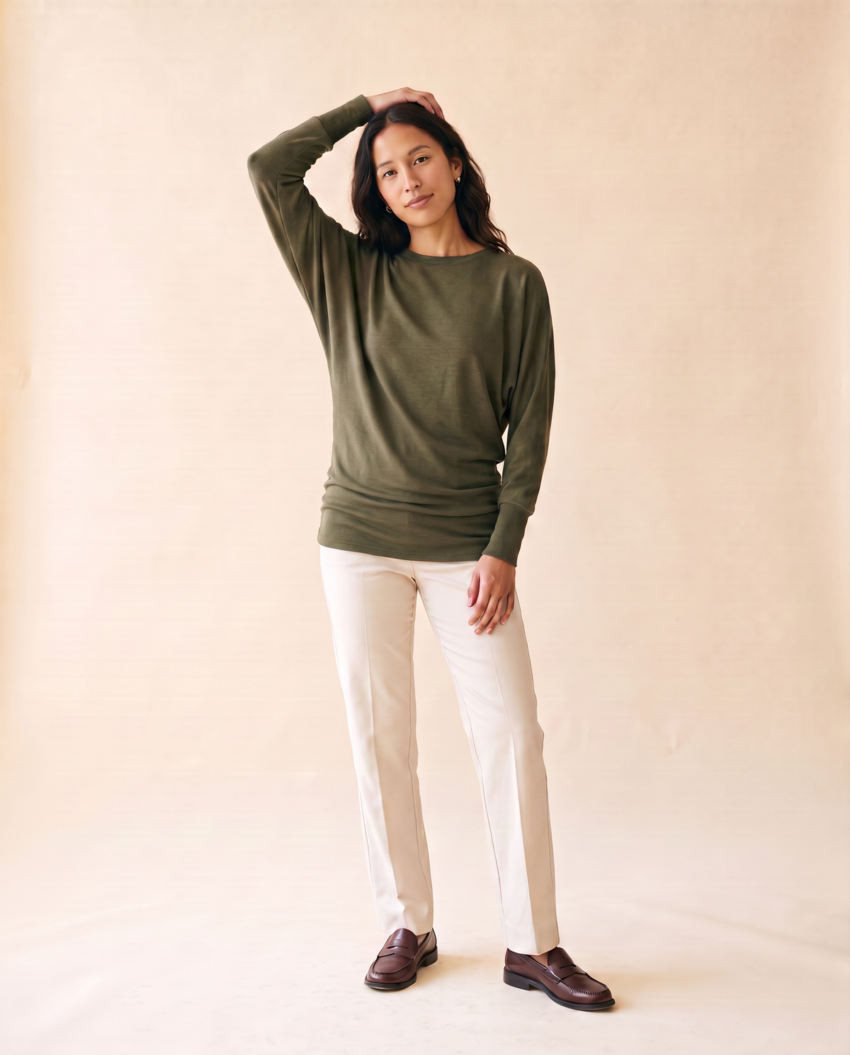 Women's Minimalist Long-Sleeve Top in Green - model front view