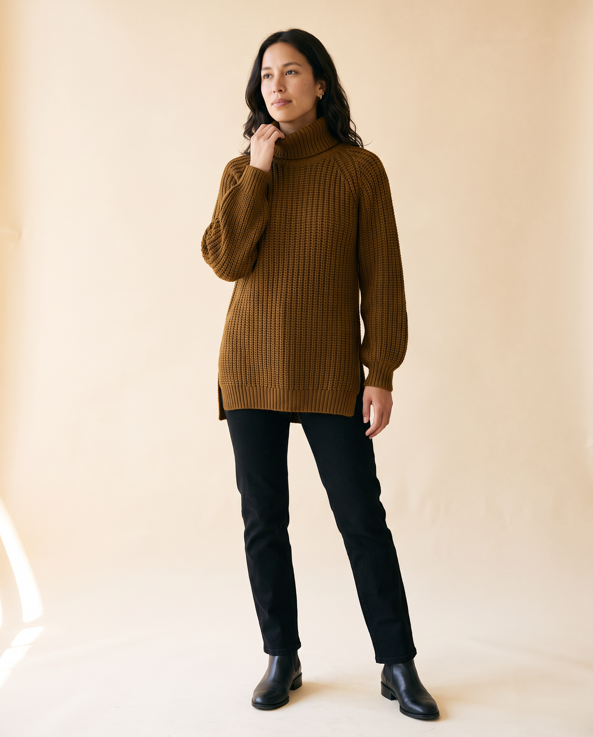Women's Split-Hem Turtleneck Sweater in Dark Brown - model front view