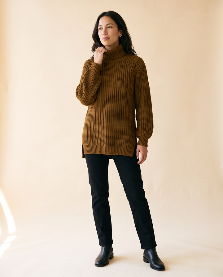 Women's Split-Hem Turtleneck Sweater in Dark Brown - model front view